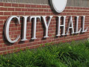 City Hall Sign Brick Wall Close Up image