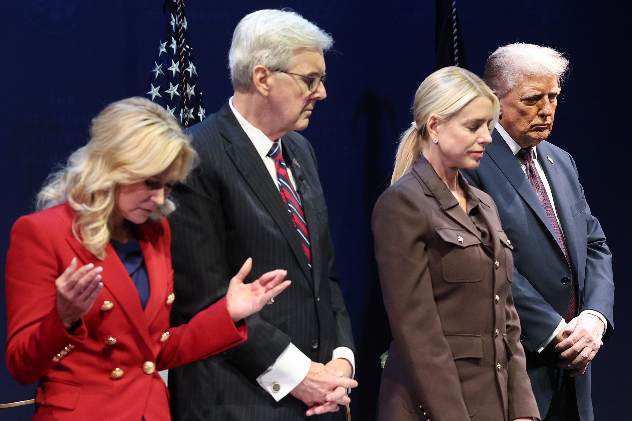 President Donald Trump prays during Religious Liberty Commission meeting before announcing "America Prays" initiative