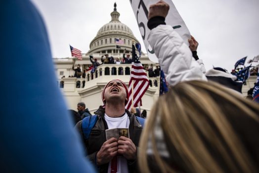 WASHINGTON, DC - JANUARY 06: Pro-Trump supporters storm the U.S. Capitol following a rally with President Donald Trump on January 6, 2021 in Washington, DC. Trump supporters gathered in the nation's capital today to protest the ratification of President-elect Joe Biden's Electoral College victory over President Trump in the 2020 election. (Photo by Samuel Corum/Getty Images)