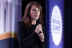 WASHINGTON, DC - AUGUST 30: Co-founder of Moms for Liberty Tina Descovich speaks during the 2024 Joyful Warriors National Summit on August 30, 2024 in Washington, DC. Trump continued to campaign for the upcoming presidential election on November 5, 2024.